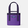 Purple tote bag with light blue accents with a Yeti logo on the front that is dark purple and light blue.