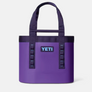 Purple tote bag with light blue accents with the Yeti logo on the front that is light blue and dark purple.