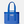 Front view of a Yeti carryall bag that has a yeti patch on the front that is silver and the bag is a royal blue color.